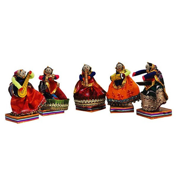 A set of five hand-painted wooden dolls depicting musicians playing traditional Indian instruments, dressed in colorful clothing.