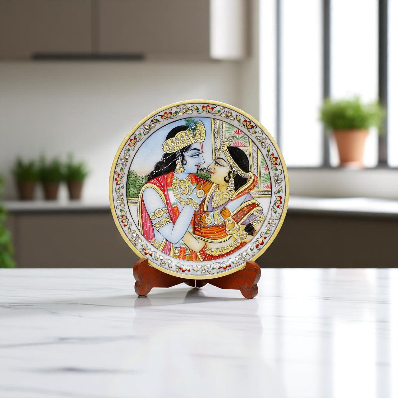 Decorative plate with a couple design on a stand in a modern kitchen setting