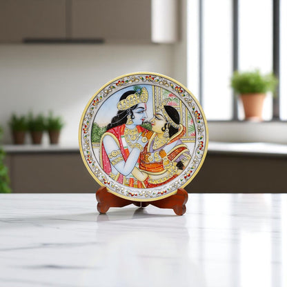 Decorative plate with a couple design on a stand in a modern kitchen setting