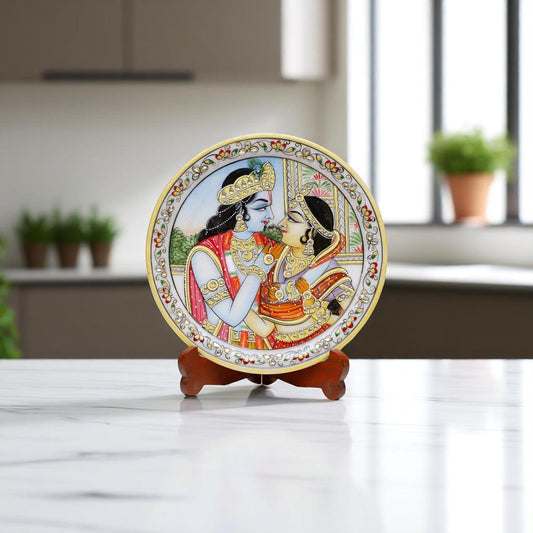 Decorative plate with a couple design on a stand in a modern kitchen setting