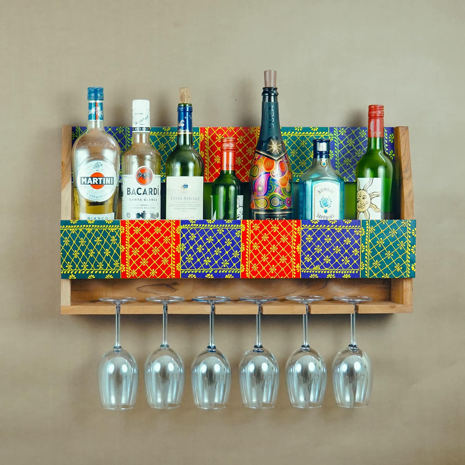 A wooden wine glass rack with a colorful pattern, holding wine bottles and glasses.