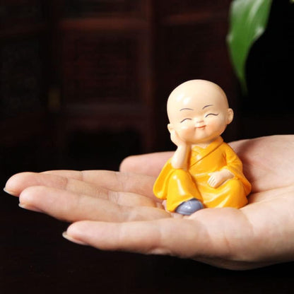 Polyresin Baby Monk Buddha Serene Figurine Showpiece Set Of - 4 pcs