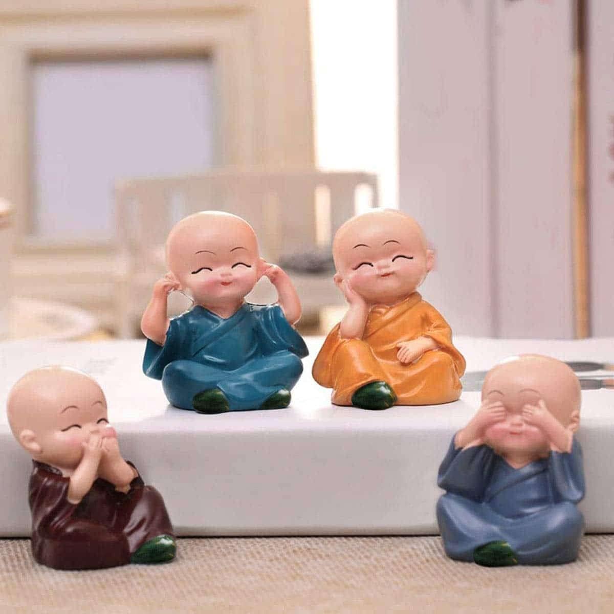Polyresin Baby Monk Buddha Serene Figurine Showpiece Set Of - 4 pcs