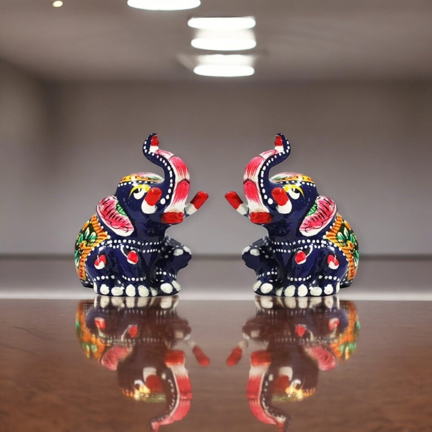 Matel Small Elephant Sitting For Showpiece